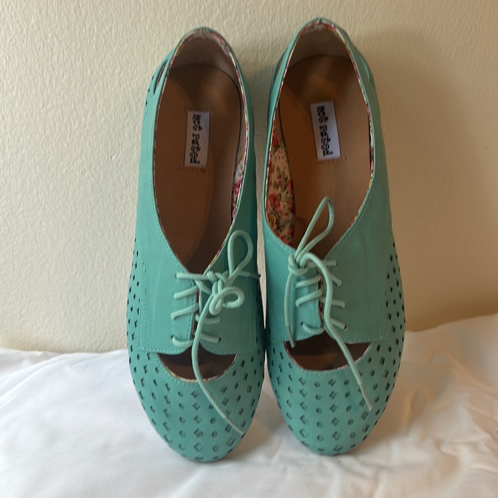 Teal flats with cutouts size 8.5, brand Not Rated